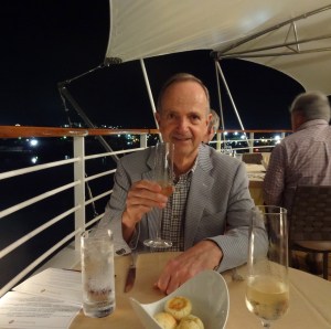 Art enjoys the impeccable service at Restaurant II while docked in Antigua one evening.
