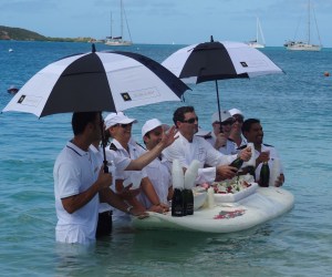 Chef opens the first bottle of champagne.