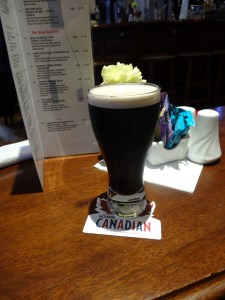 Guinness: An Irish tradition served on a Canadian beer coaster!