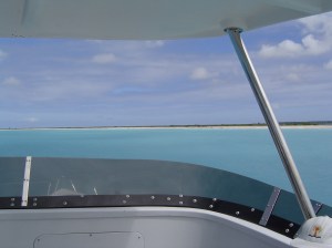 The deserted beach ringing the tiny Caribbean island of Barbuda just coming into view as we approach from Antigua via fast ferry. 